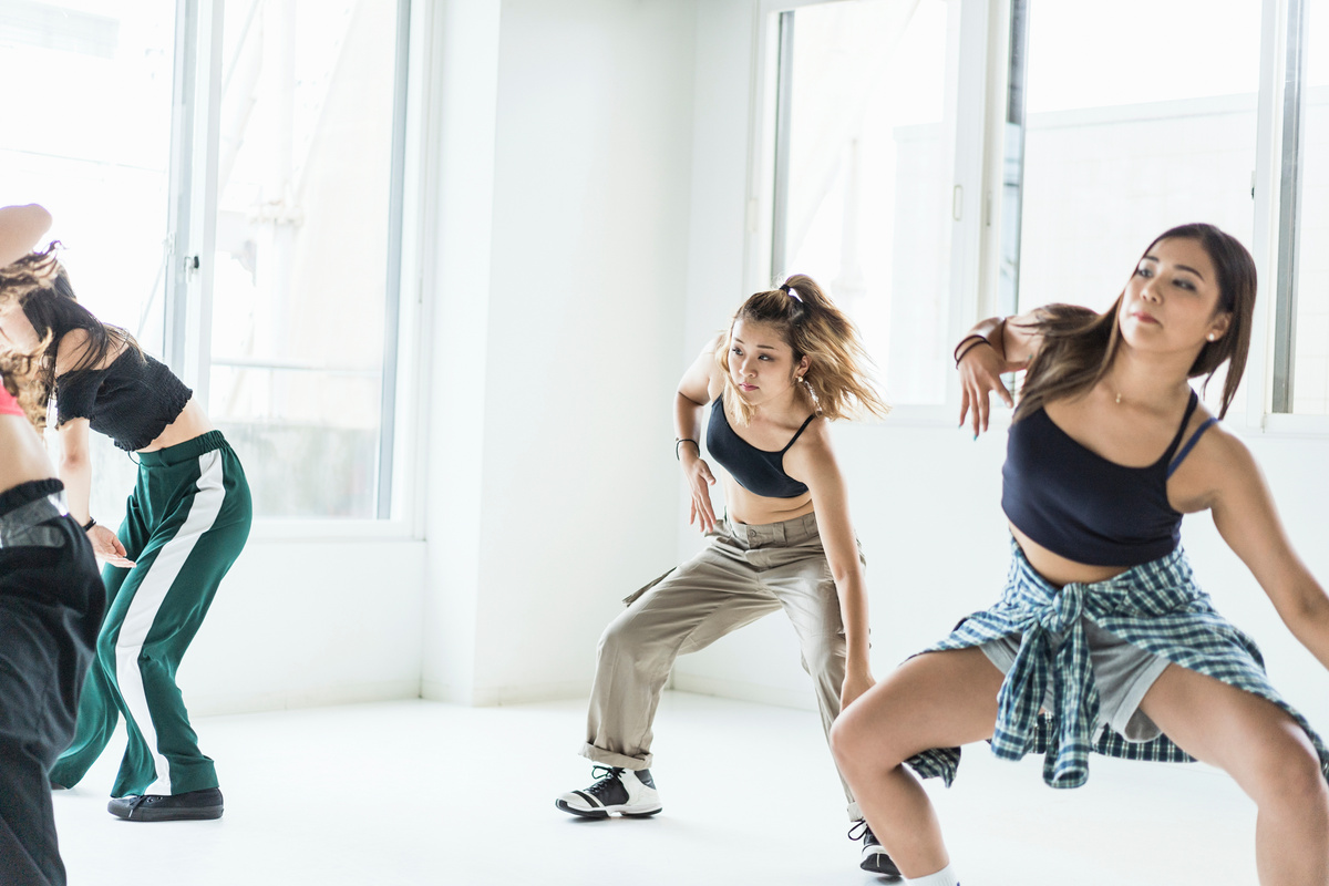 Young female dancer dancing at dance studio.